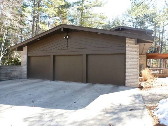 Side entry 3 car garage.  The large concrete driveway was installed in 2008!
