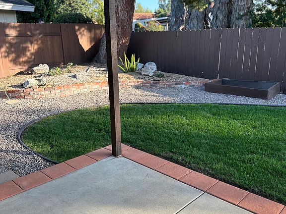 Backyard from under the patio.