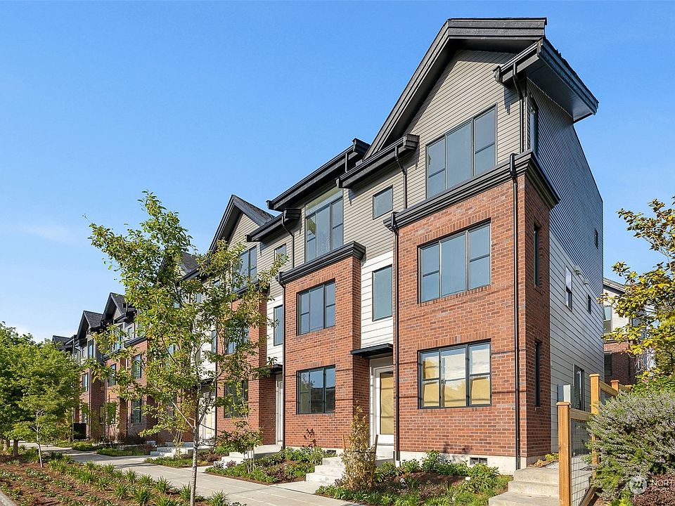 In the Willow community, the charm of brick facades, timeless angled rooflines, and impeccable landscaping take center stage.>