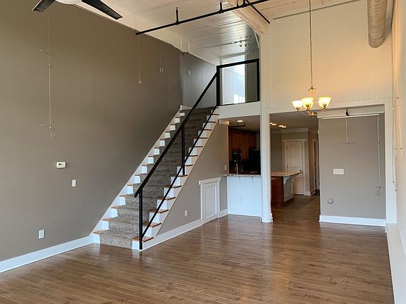 Dinning area and staircase to bedroom.