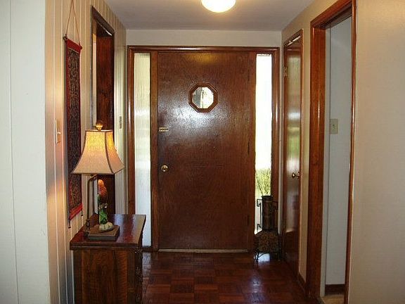 Inviting foyer w/closet gives your guests a place to hang coats