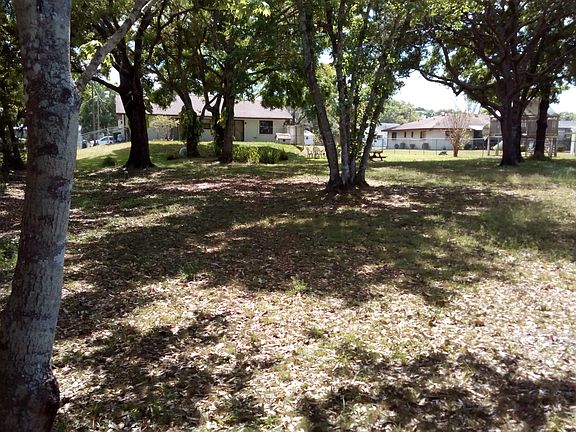 Large fenced yard.