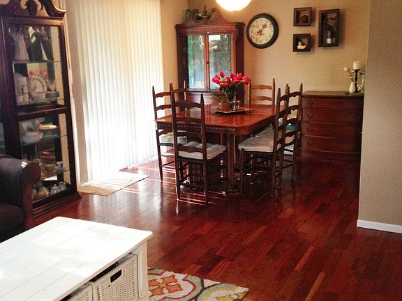 main floor - sunny dining room opens to deck