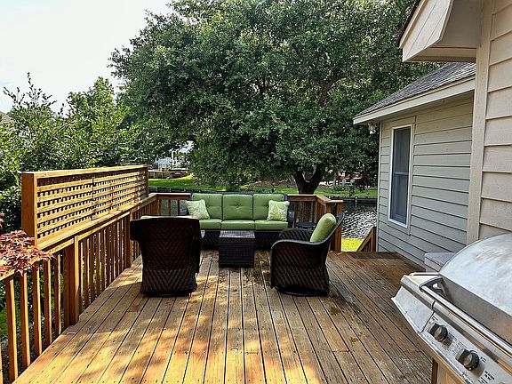 Deck overlooking pond.