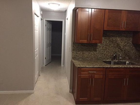 Hall way to bedrooms/bathroom