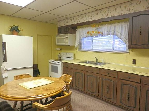 Electric range & refrigerator plus microwave included