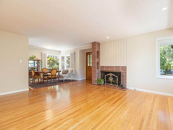 Living room with open dining area