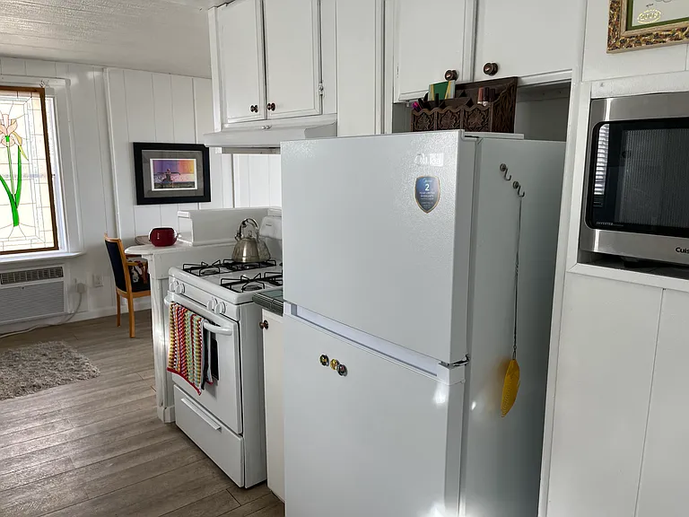 Kitchen. New refrigerator . Gas stove
Microwave