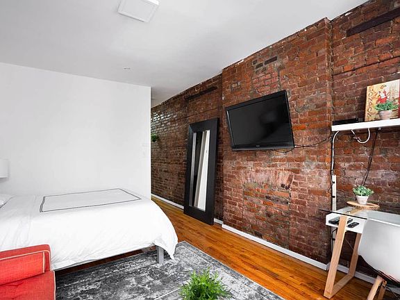 3rd image of 240 E 26th St APT 3A