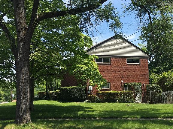 Side-view of the house on corner lot.