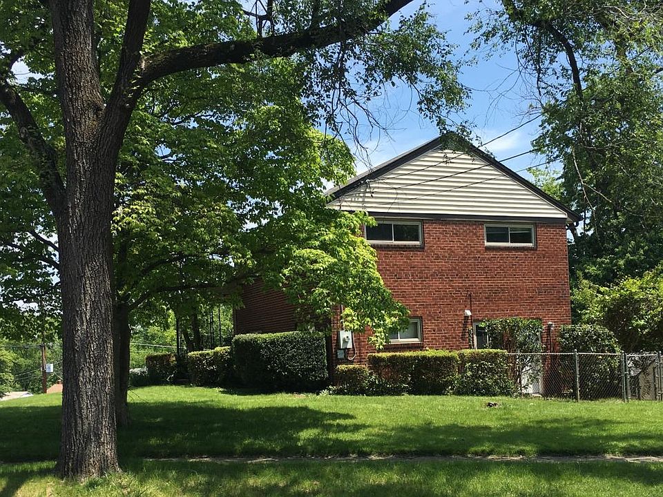 Side-view of the house on corner lot.