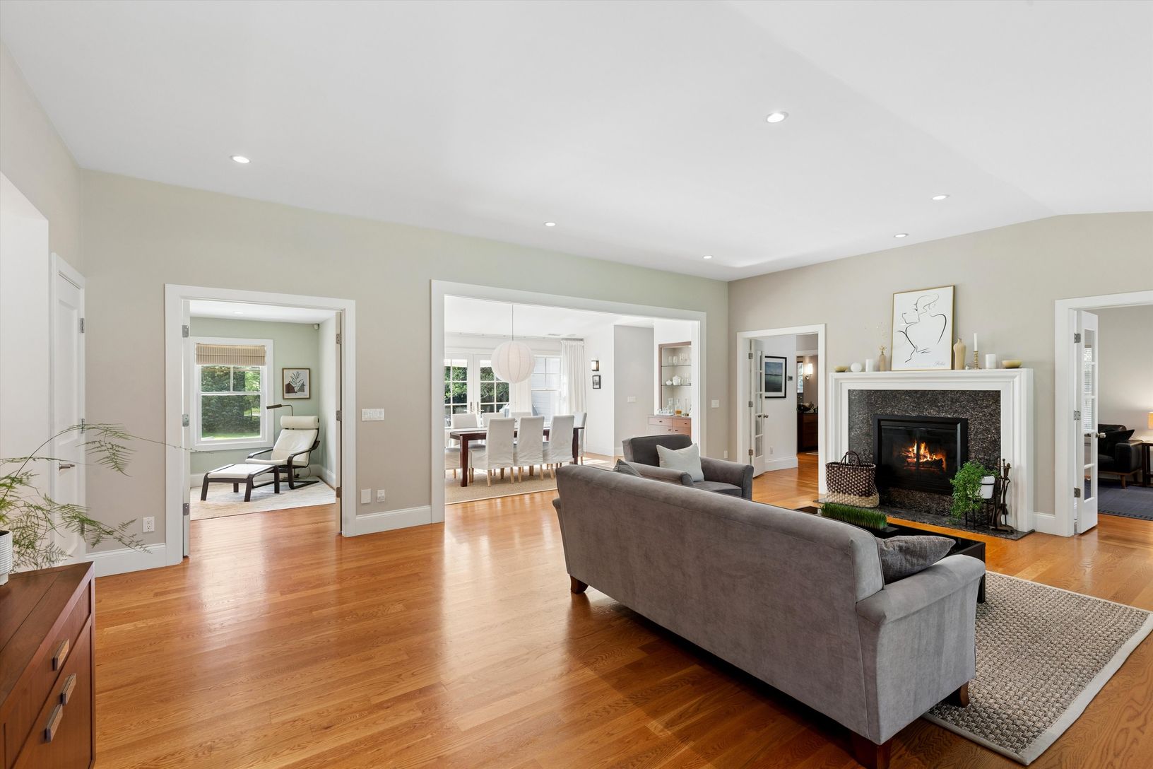  Living room with wood burning fireplace.