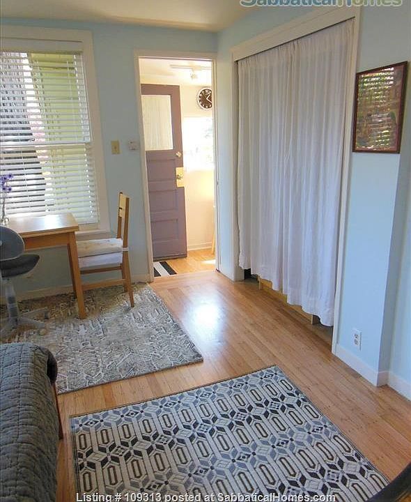 Large closet and dresser behind curtain