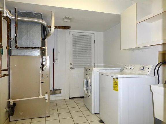 Laundry and furnace, ground level