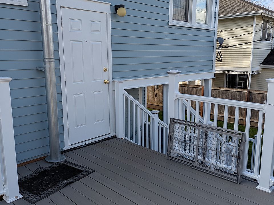 Back door entrance to the upper unit.
