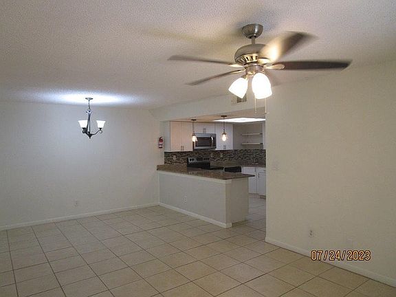Another view of living room / dining room area