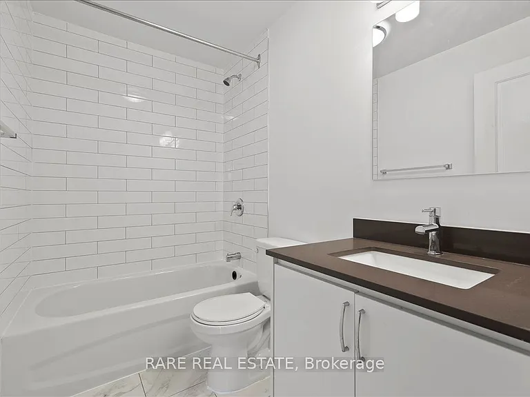 3101 Eglinton Ave E #110 — Photo 6