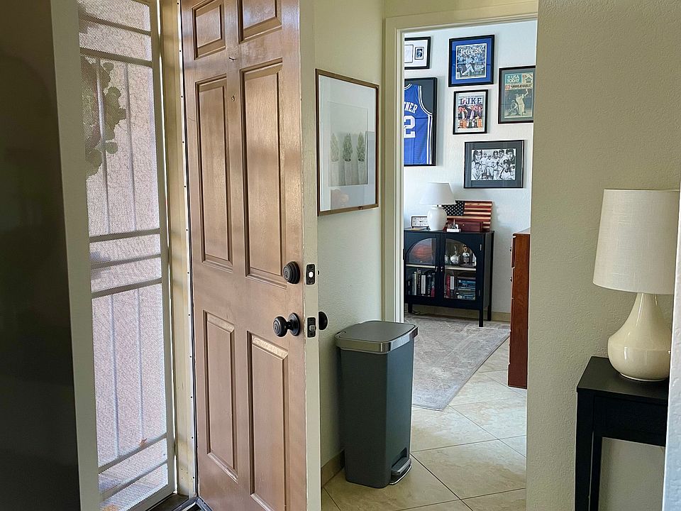 Front entry, main level right by covered parking spot for ease of entry