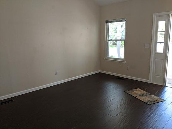 Living Room. Easy care tile floor new 3 years ago.