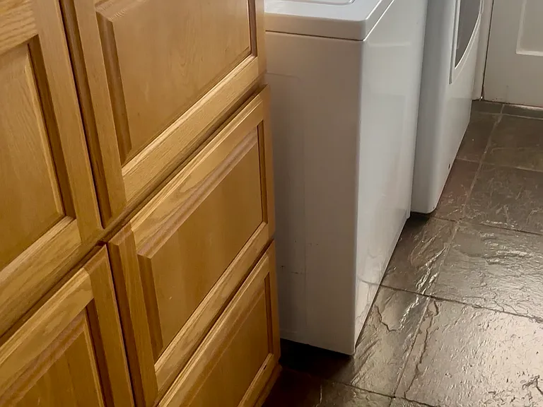 LAUNDRY ROOM- WASHER/DRYER INCLUDED. AMPLE PANTRY STORAGE.