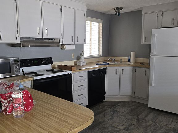 2nd image of 6942 W OLIVE Avenue #59