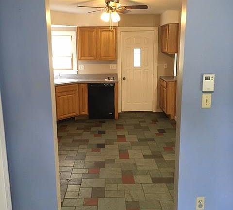 Front door and kitchen