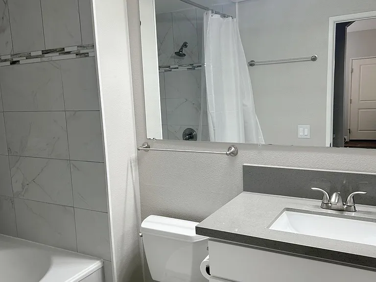 Both bathrooms were renovated with quartz countertops and soaking tubs.