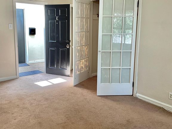 Living room/ bedroom studio with large closet which was originally used for a murphy bed. Another large closet is down the hallway to the bathroom