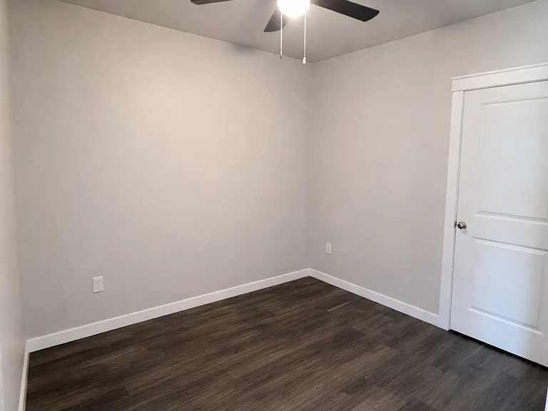 Second bedroom perfect for guests, office, or roommate setup.