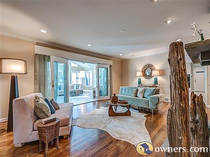 Cozy den with stone fireplace