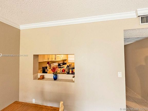2nd image of 9420 N Poinciana Pl #115
