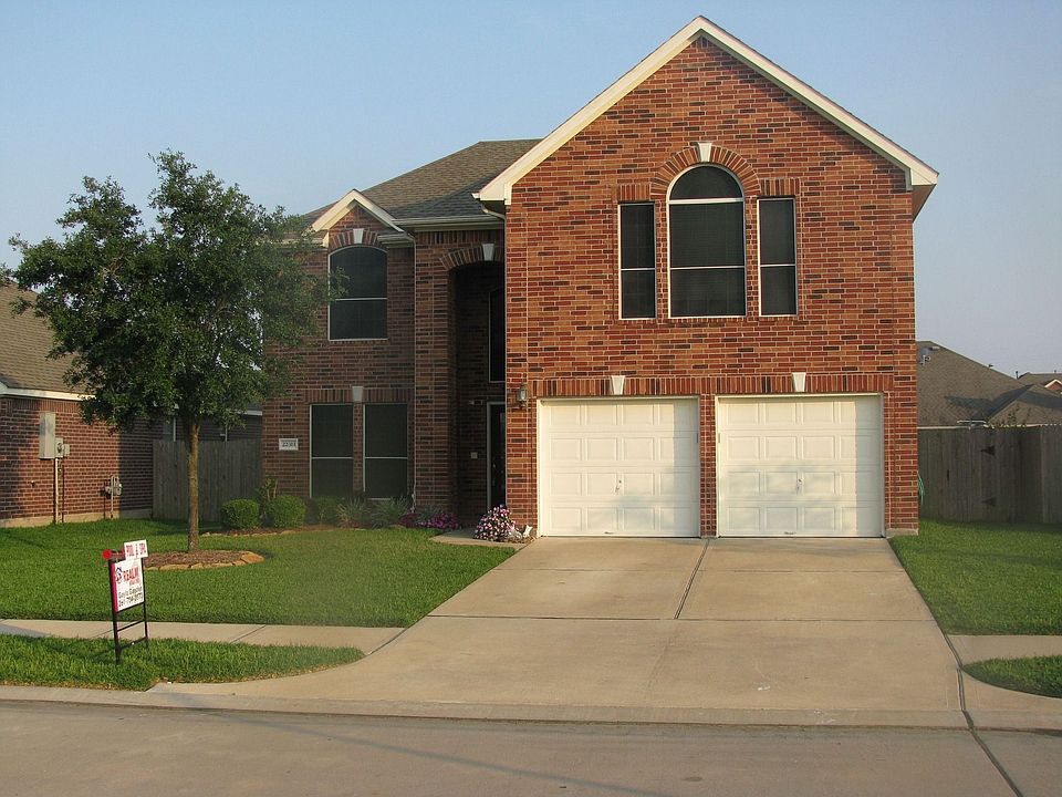 Front of the house. Notice the money saving solar screens.