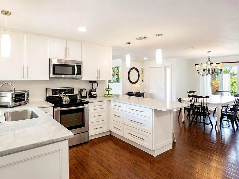 Kitchen with view of dining room