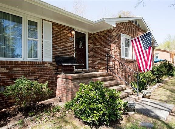 Brick stoop and steps at the front entrance.