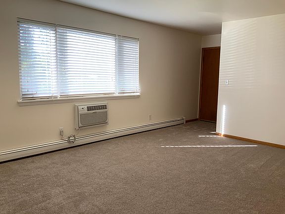Spacious Living Room with new carpeting