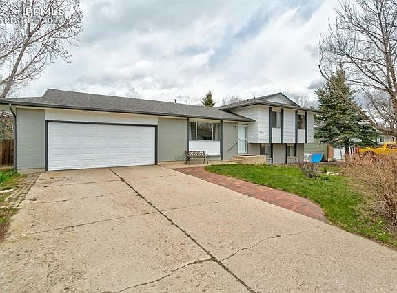 Attached 2 car garage with opener & a flat concrete driveway!