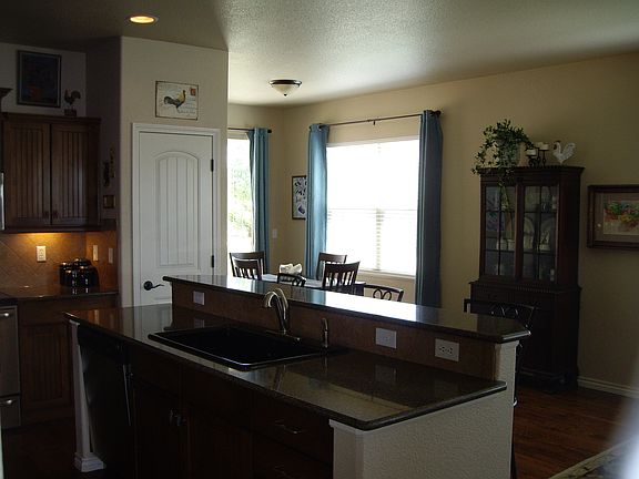 Kitchen looking into nook & living rm