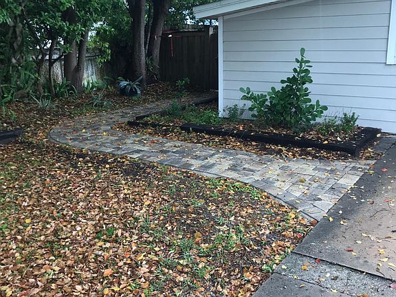 new pavers from driveway to backyard and patio