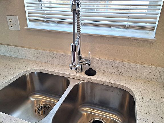 Deep sink with pull-down faucet