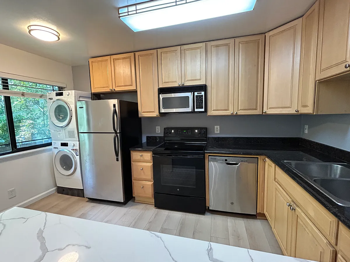 Kitchen detail, maple cabinets and granite countertops - 1623 Alcatraz Ave #B