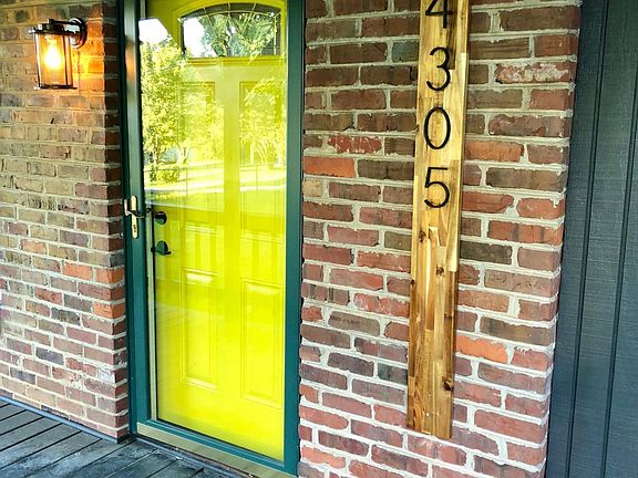 Fun welcoming entrance with custom address plate.