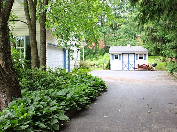 Drive and side load garage