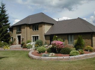 65 Brewer Rd, Leonard, MI 48367