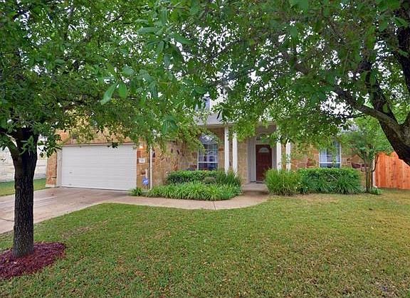front yard and house.   Beautiful yard.