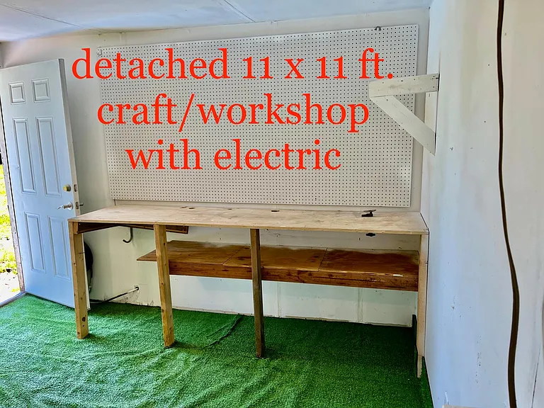 Plenty of storage. 12 X 18 foot garage AND 11.5 X 11.5 storage/craft/workshop with electricity.
