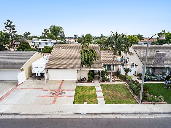 Front view w/RV parking on L