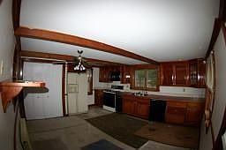 Kitchen with custom cabinets & eating area