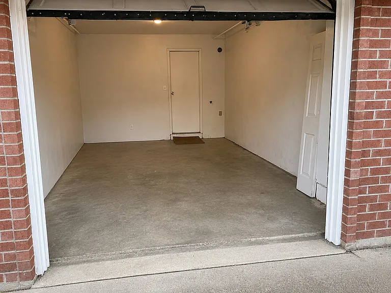 Spacious garage with access to the kitchen from the garage.