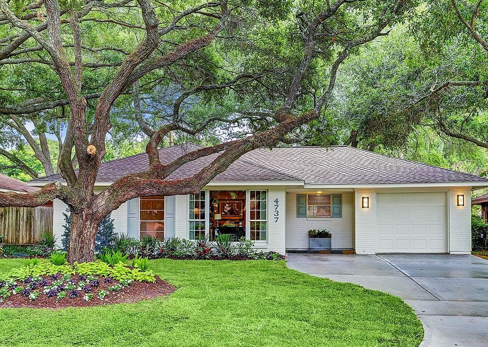 Welcome to 4737 Sanford! Driveway is six months young and can accommodate two cars, fresh paint, designer sconces and pristine landscape.