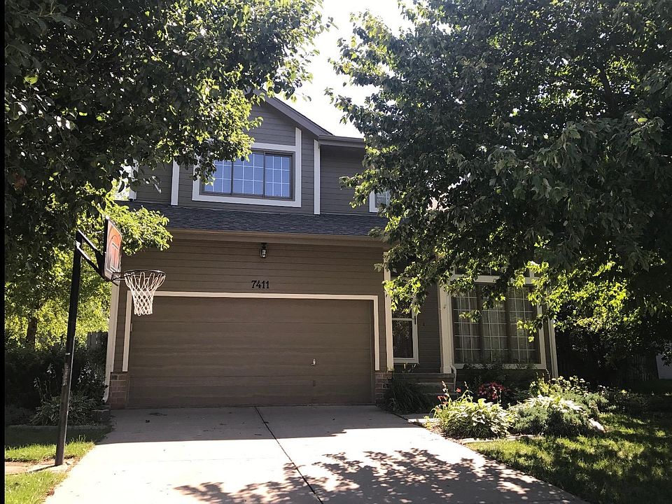 Front of house with newer paint and siding